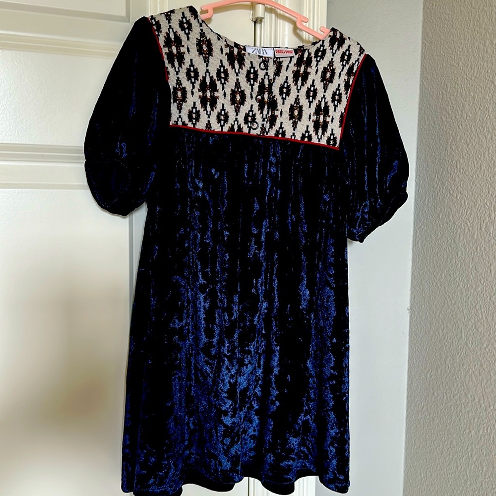 Beautiful dress for a girl made by ZARA, color dark blue.